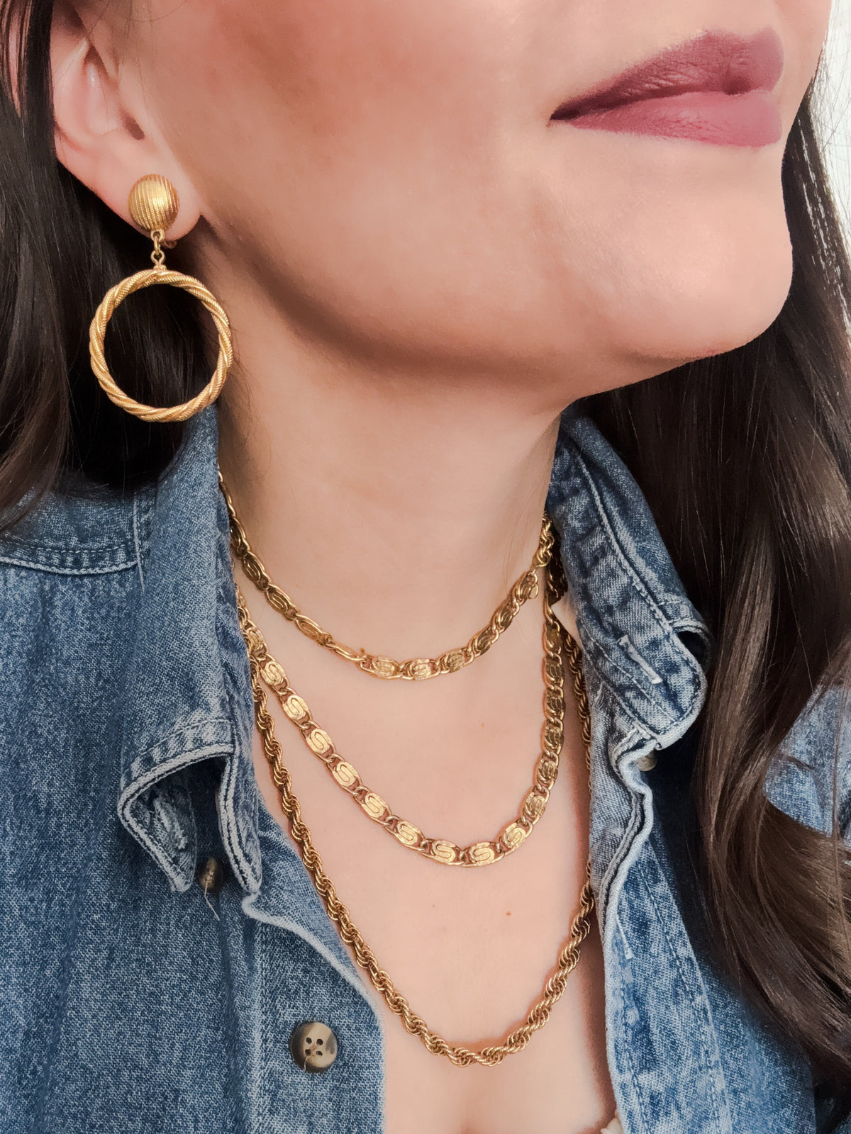 gold rope twist hoop doorknocker clip-on earrings. 