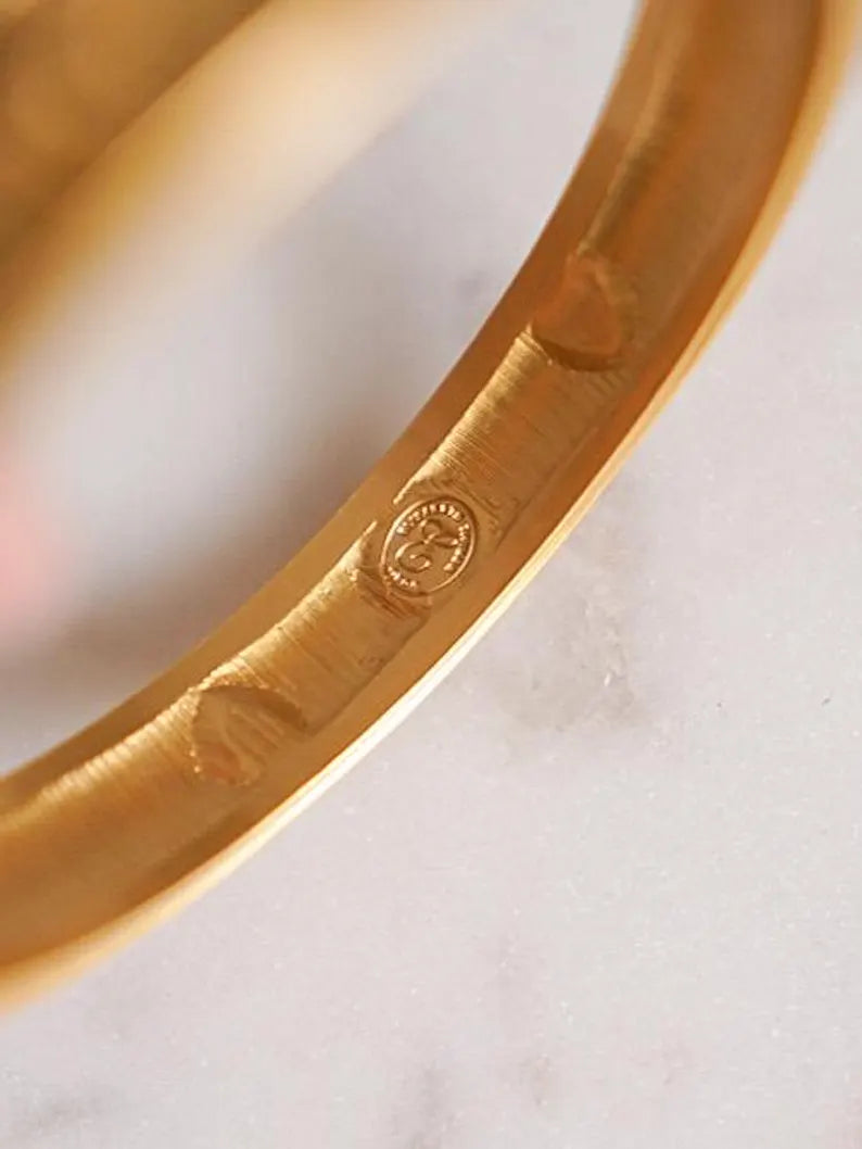 1990s ELIZABETH TAYLOR for AVON Matte Gold Bangle